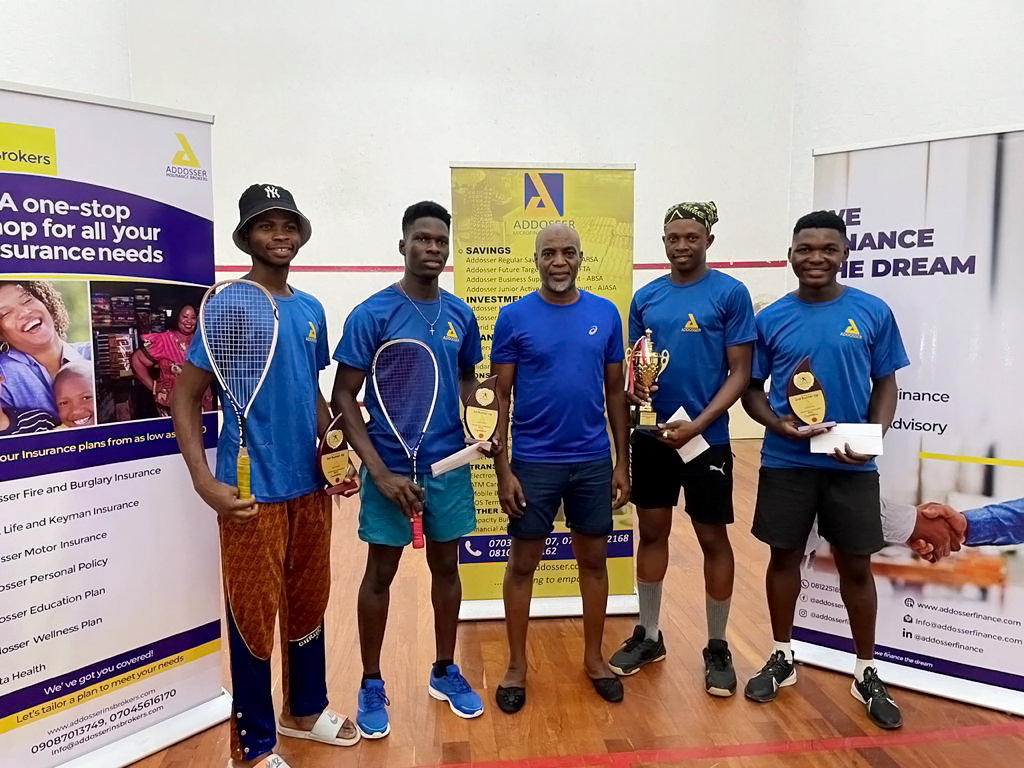 Winners of the Addosser Squash Pro Tournament with the Group Managing Director